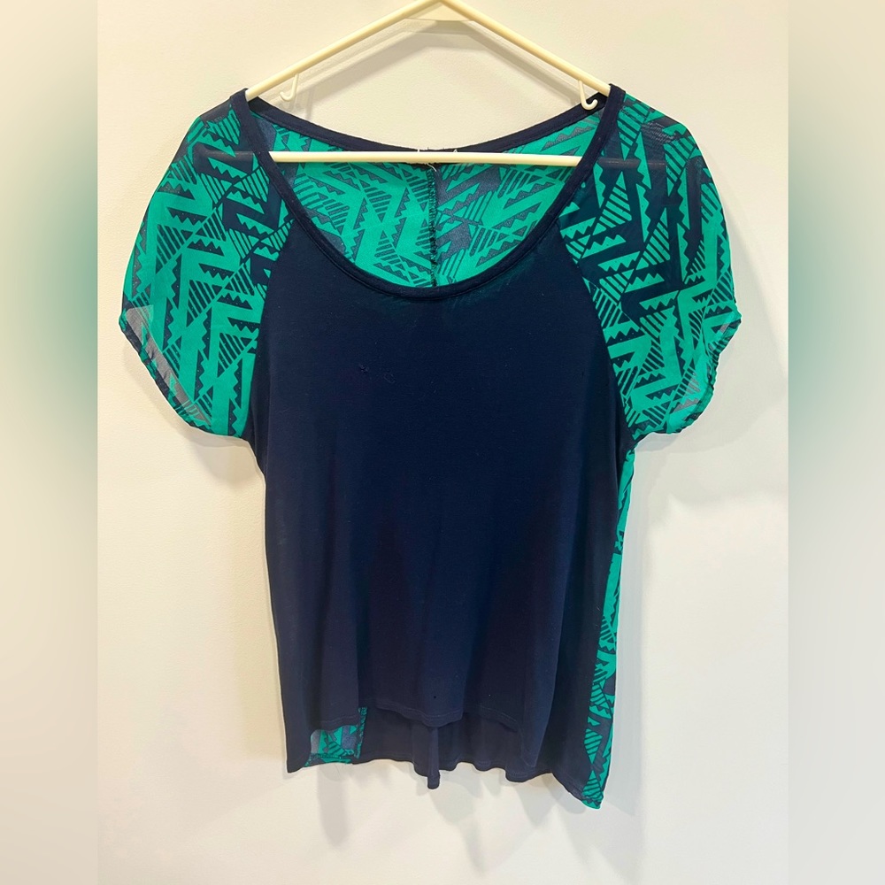 Billabong? Semi-sheer top with green patterned sleeves